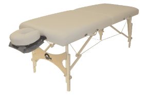 Massage Table Aurora Color: Opal Patented Integra Hinge - Oakworks exclusive design integrates the attachment of the bracing system to offer incredible strength and lighter weight that no piano hinge can match. Engraved Wooden Knobs - Low profile design with built in grip band is easy to use and won't get in your way like plastic knobs. UniLock - Super quick, easy to use closure system folds that out of the way for shiatsu and won't rip your sheets or mark your floor. Ultimate Access End Panel & Shiatsu Cables - Our unique system allows you to get your legs under the table at the height you work, offering the best access on the market. The shiatsu cables allow the table to be laid flat on the floor. Cable lock system - Our system uses stronger cables than anyone else, designed not to stretch or fail even under the heaviest loads. Width: 29" or 31" Length: 73" Height Range: 24" - 34" Foam: Plush Fabric: Premium, PVC free TerraTouch™ Medical Grade Fabric is ISO 10993 Certified Weight Capacity: 550 lb. Weight: 33-35 lbs