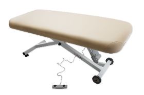 STRONGLITE Ergo-Lift Electric Lift Treatment Table - FLAT TOP 30" BEIGE Introducing the best value lift tables on the market! A rugged steel frame, durable and reliable UL listed actuator and a comfortable massage top offers years of trouble free use. ADA compliant height adjustments are easy on the practitioner and the client, plus the price is easy on your budget. Please Note: Headrest is sold separately Key Features: UL listed, smooth reliable electric lift actuator Heavy-duty steel frame Deluxe 3" cushioning system Easy to use foot pedal ADA Compliant height range Luxurious 100% PU upholstery Wheels for easy movement Made in the USA (some components sourced globally) Spa Table Specifications: Width: 30" Length: 73" Height: 17" - 36" Weight: 180 lbs. Foam: 3" Lift Capacity: 400 lbs. UL/CE Certified: UL & CE Rounded Corners: Yes Reiki Endplates: No Shiatsu Cables: No