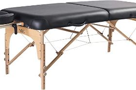 NRG KARMA PORTABLE MASSAGE TABLE Professional Grade Portable Massage Table built for years of performance on the road or in your treatment room COMPLETE MASSAGE THERAPY PACKAGE - Package includes NRG Karma Portable Massage Table, Headrest with Cushion and a Carrying Case TOP QUALITY MATERIALS - Made from the strongest and most durable wood, a triple density 3" foam system for extra comfort, standard rounded corners, standard Reiki end panels for easy access, double wheel knobs for strength and a beautiful finish DURABLE & EASY CLEAN UP - Upholstered in smooth, soft, easy-to-clean Levante vinyl that resists the effects of age and stains EASILY COMPACTS FOR TRANSPORT - Dimensions when table is folded: 36" x 31" x 10". - Portable table weight is 38 lbs. Carrying case included.