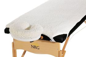 NRG Fleece Massage Table Pad and Face Rest Cover Set NRG has created a fleece massage table pad and face rest cover set that is perfect for keeping even the most sensitive of massage therapy clients comfortable. This 72" by 31" pad will fit massage tables that are up to 33" wide, and the edges can be easily secured on smaller tables. This synthetic fleece massage table cover set is perfect for clients that might be allergic to wool. All of your other clients will enjoy this cover set as well because the 1" pad is extremely soft and comfortable and the synthetic materials stay cool in the summer and warm in the winter. This durable massage table pad, which is available in a cream color, is sure to impress. A great addition to your portable or stationary massage table. This 72" by 31" pad will fit massage tables that are up to 33" wide, and the edges can be easily secured on smaller tables. Materials: Synthetic 90% Polyester 10% Acrylic Weight: 22 oz per sq yard. Cleaning Instructions: This product can be washed on gentle cycle Tumble on low heat or hang to drip dry Do not press or steam.