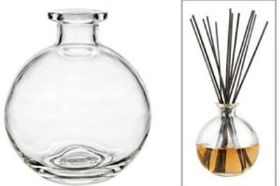 Round Glass Diffuser Bottle These Round Glass Diffuser Bottles are great for use with our light or dark round reed sticks to diffuse all of your favorite fragrance or essential oils. These bottles are 4” wide x 4.5” tall and hold 250ml. *Bottle only. Reed Sticks and Oil not included