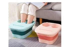 Multifunction Collapsible Feeting Soak Tub Collapsible Foot Bath Basin for Soaking Feet, Pedicure Foot Spa, Plastic Bucket with Handles and Massage Acupoint. The capacity is up to 15 L while full. Interior bottom length is about 11 inches , fits about 9.5 length's feet. Come in Green or Pink.